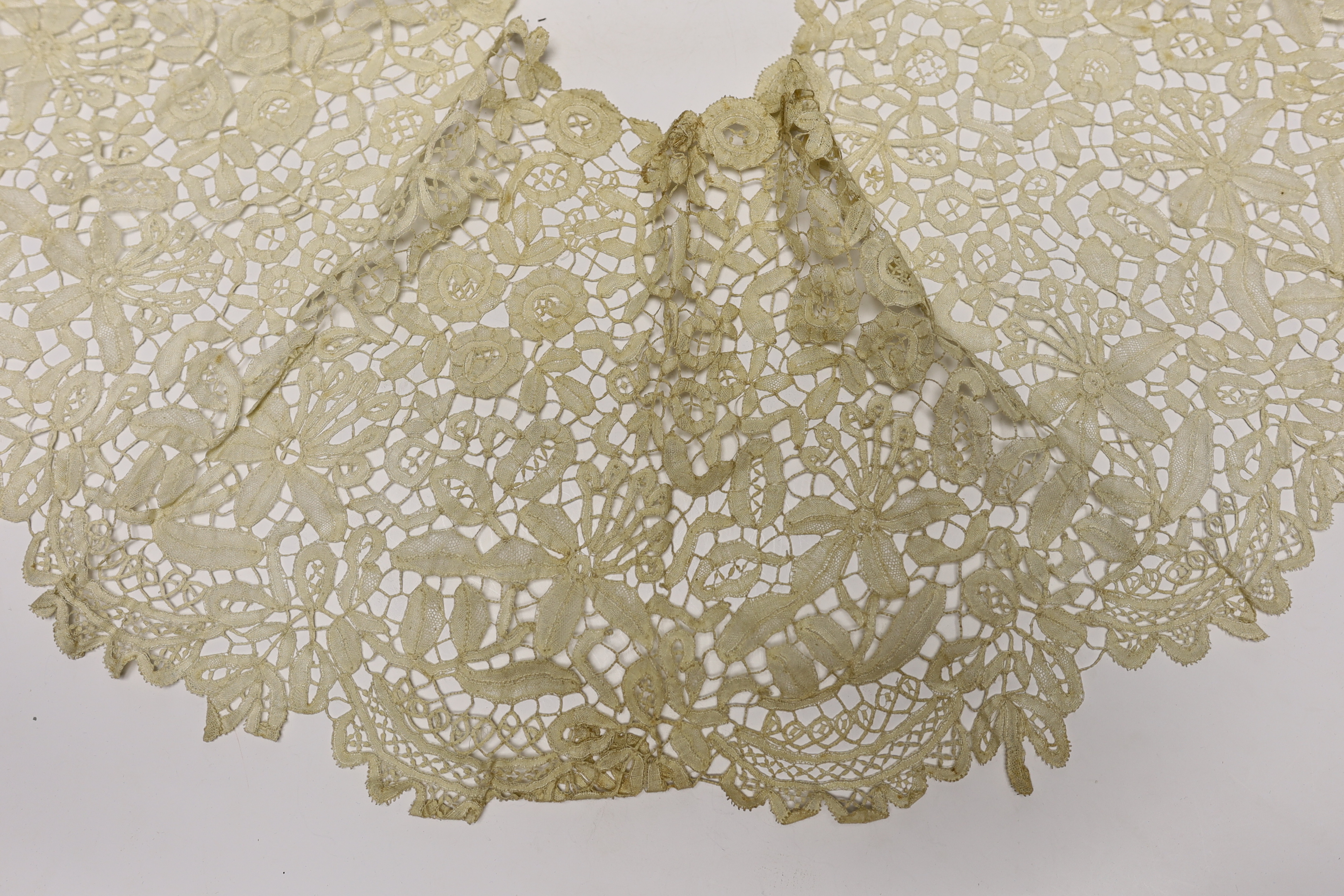 A long 19th century mixed Brussels lace collar, with 20 needle lace oval insertions, a similar wider Honiton bobbin lace collar and a machine lace bonnet veil